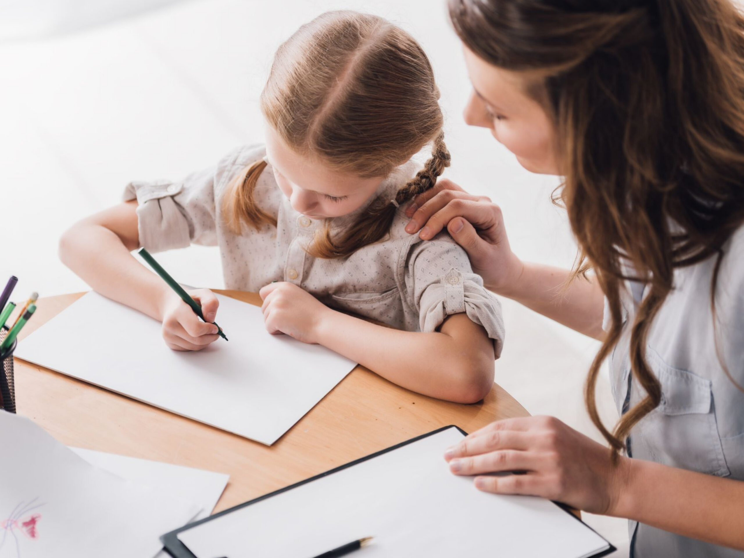 Tutor helping a student with homework
